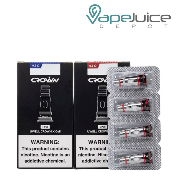Two Box of UWELL Crown X Replacement Coils with a warning sign anc a pack of coils - Vape Juice Depot