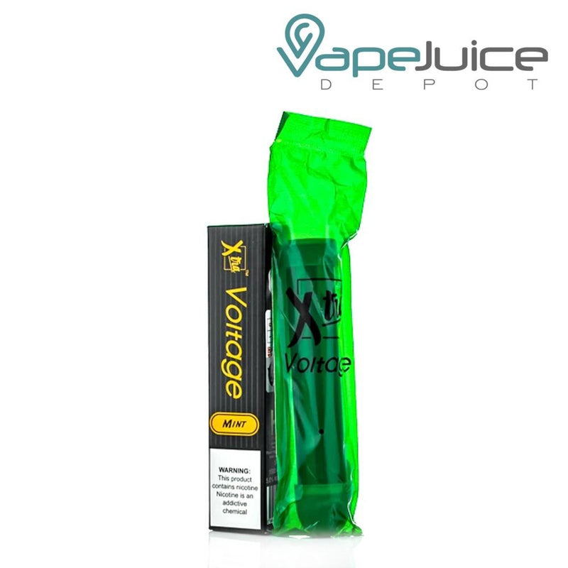 Mint flavored Xtra Voltage Disposable Device inside a packet and a box next to it - Vape Juice Depot